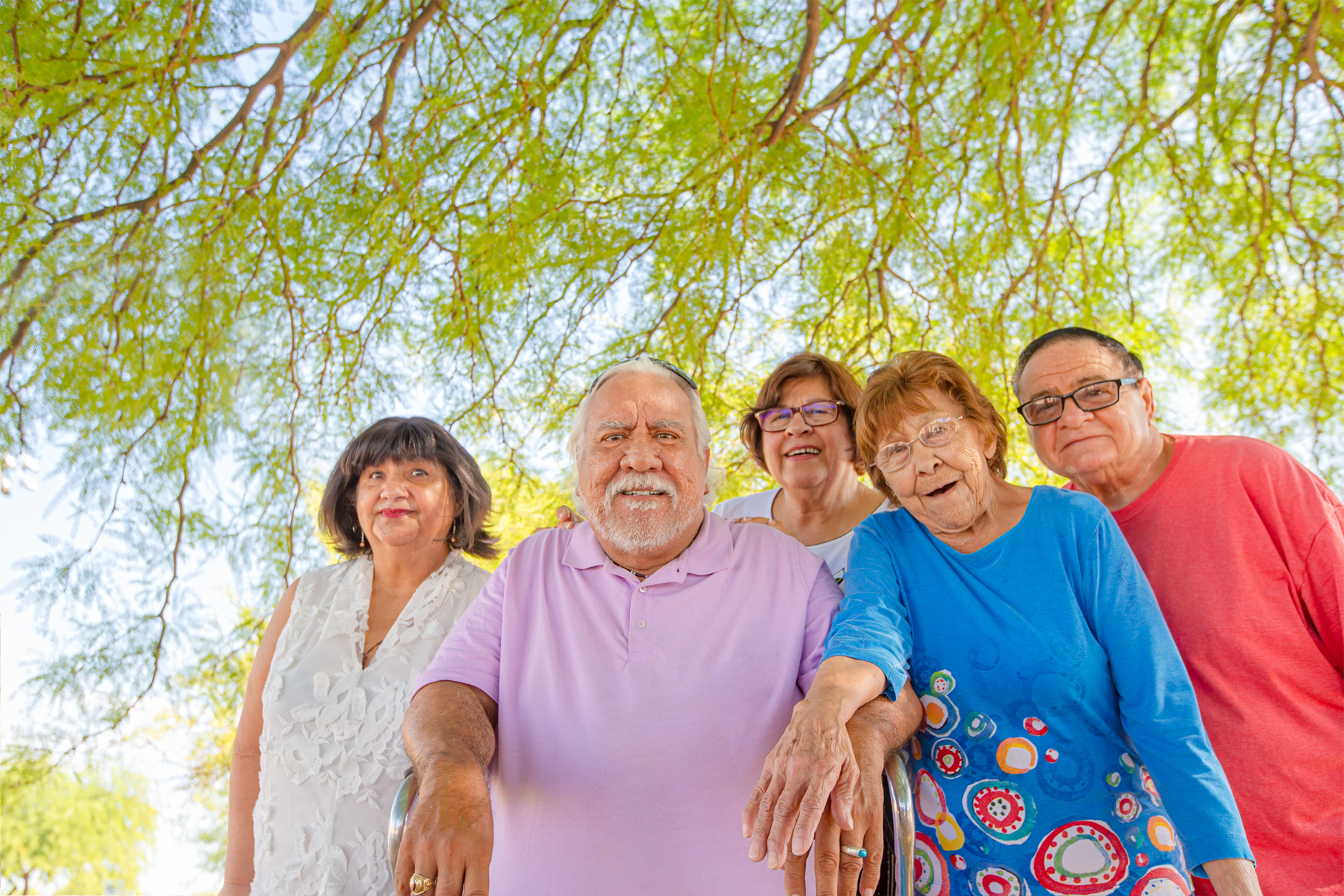 Group of smiling seniors outdoors